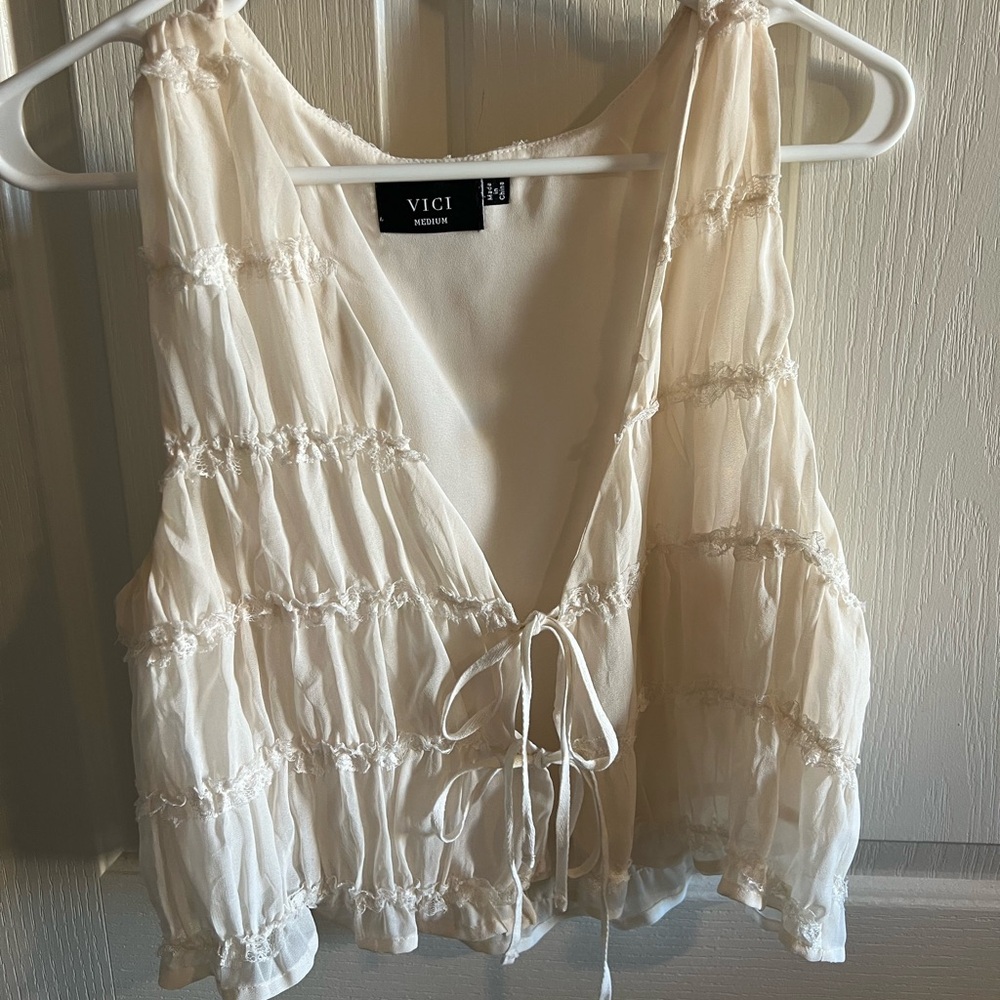 Vici Cream Sleeveless Blouse